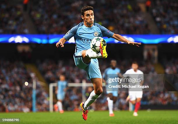 Jesus Navas of Manchester City controls the ball during the UEFA Champions League Play-off Second Leg match between Manchester City and Steaua...