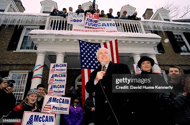 John McCain campaigns in front of a Dartmouth College frat house, January 31, 2000 in Hanover, New Hampshire.