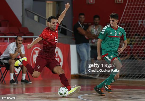 Portugal's Fabio Cecilio with Morocco's Mohamed Jouad in action during the Futsal International Friendly match between Portugal and Morocco at...