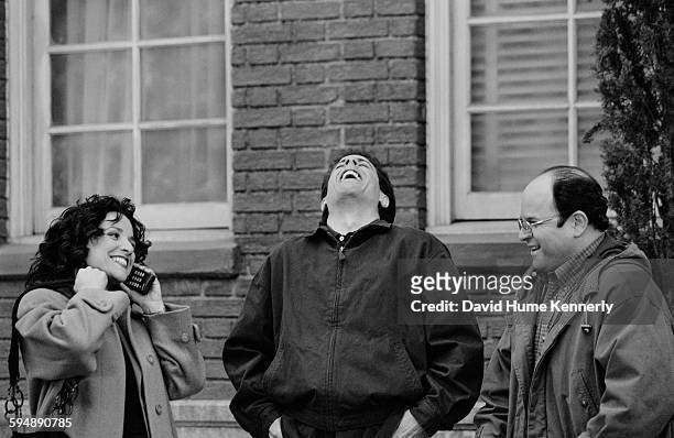 Actors Julia Louis-Dreyfus, Jerry Seinfeld, and Jason Alexander talk in between filming the last episode of the hit television show "Seinfeld," April...