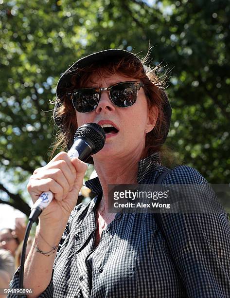 Actress Susan Sarandon speaks during a rally on Dakota Access Pipeline August 24, 2016 outside U.S. District Court in Washington, DC. Activists held...