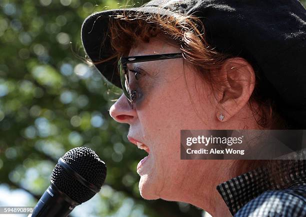 Actress Susan Sarandon speaks during a rally on Dakota Access Pipeline August 24, 2016 outside U.S. District Court in Washington, DC. Activists held...