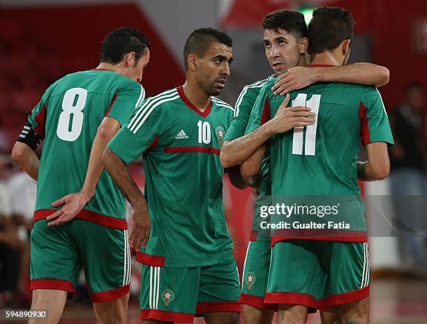 Morocco's Mohamed Jouad celebrates with teammates after scoring a goal during the Futsal International Friendly match between Portugal and Morocco at...