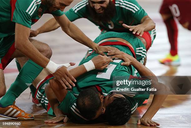 Morocco's Yahya Baya celebrates with teammates after scoring a goal during the Futsal International Friendly match between Portugal and Morocco at...