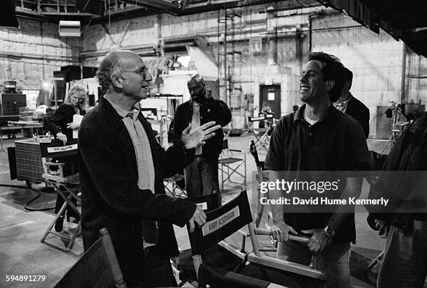 Seinfeld" co-creators Jerry Seinfeld and Larry David talk on the set in between filming the last episode of the hit television show "Seinfeld," April...