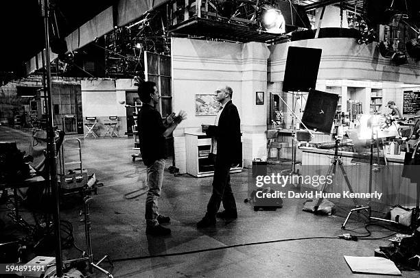 Seinfeld" co-creators Jerry Seinfeld and Larry David talk on the set in between filming the last episode of the hit television show "Seinfeld," April...