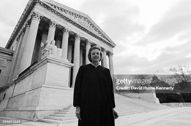 Newly appointed Supreme Court Justice Sandra Day O'Connor stands in front of the US Supreme Court Building following her being sworn in, September 25...