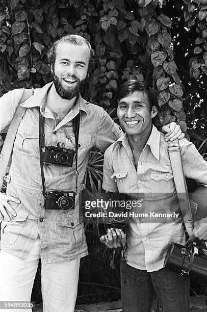 Photojournalists David Hume Kennerly and Willie Vicoy pose together circa 1975 in Saigon, South Vietnam . Vicoy would later be fatally injured during...