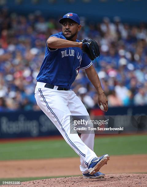 Franklin Morales of the Toronto Blue Jays delivers a pitch in the fourth inning during MLB game action against the Seattle Mariners on July 23, 2016...