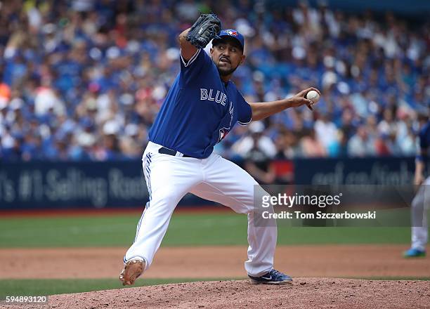 Franklin Morales of the Toronto Blue Jays delivers a pitch in the fourth inning during MLB game action against the Seattle Mariners on July 23, 2016...