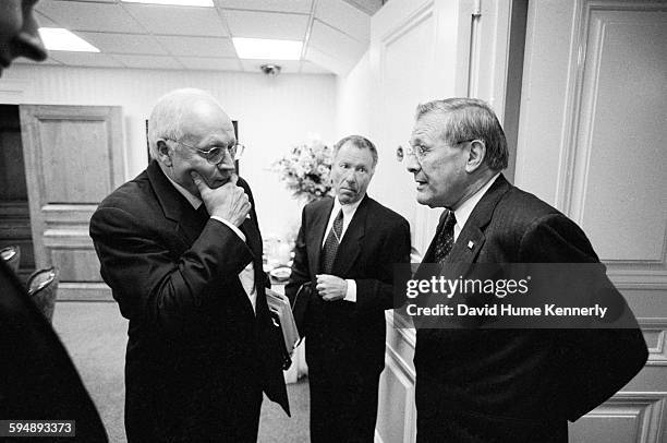 Vice President Dick Cheney, Chief of Staff to the Vice President Scooter Libby, and Secretary of Defense Donald Rumsfeld talk outside the Pentagon...