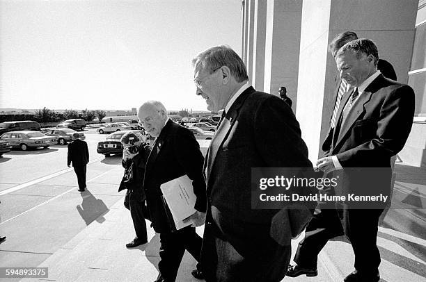 Vice President Dick Cheney, Secretary of Defense Donald Rumsfeld, and Chief of Staff to the Vice President Scooter Libby leaving the Pentagon on...