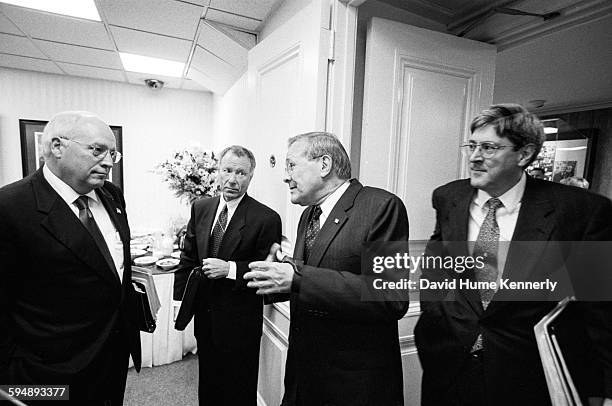 Vice President Dick Cheney, Chief of Staff to the Vice President Scooter Libby, and Secretary of Defense Donald Rumsfeld talk outside the Pentagon...