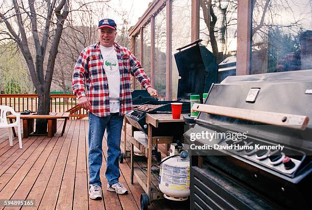 Presidential candidate John McCain manning the barbecue at the McCain family ranch, March 9, 2000 near Sedona, Arizona.