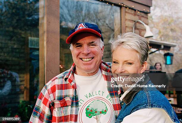 Presidential candidate John McCain and his wife, Cindy McCain, smile for the camera at their family ranch, March 9, 2000 near Sedona, Arizona.