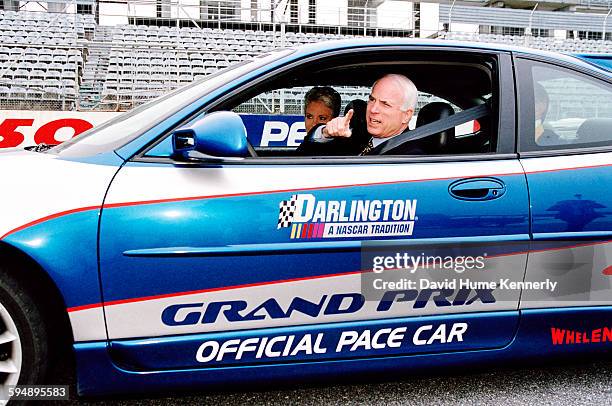 Presidential candidate John McCain and his wife, Cindy McCain, at a Nascar event during his campaign, circa 2000.