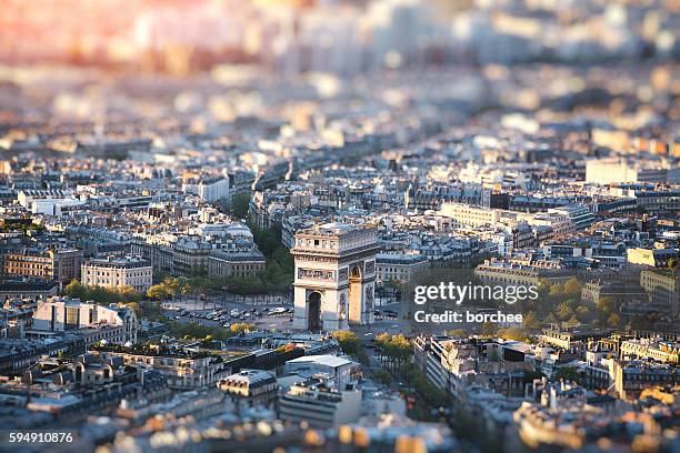 arc de triomphe in paris - avenue des champs elysees stock pictures, royalty-free photos & images