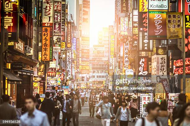 sunset at shinjuku - japan street stock pictures, royalty-free photos & images