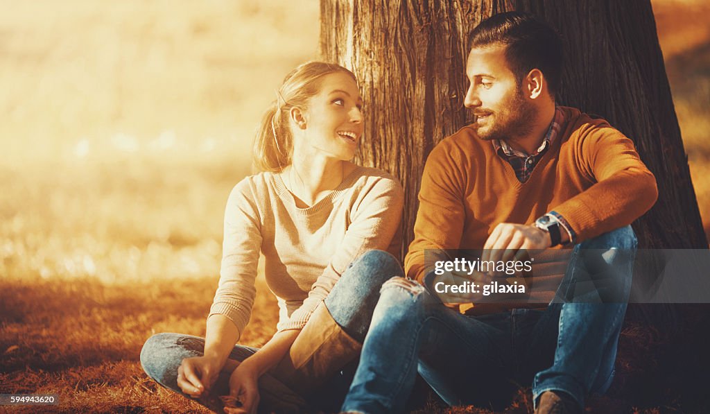 Couple relaxing in a park.