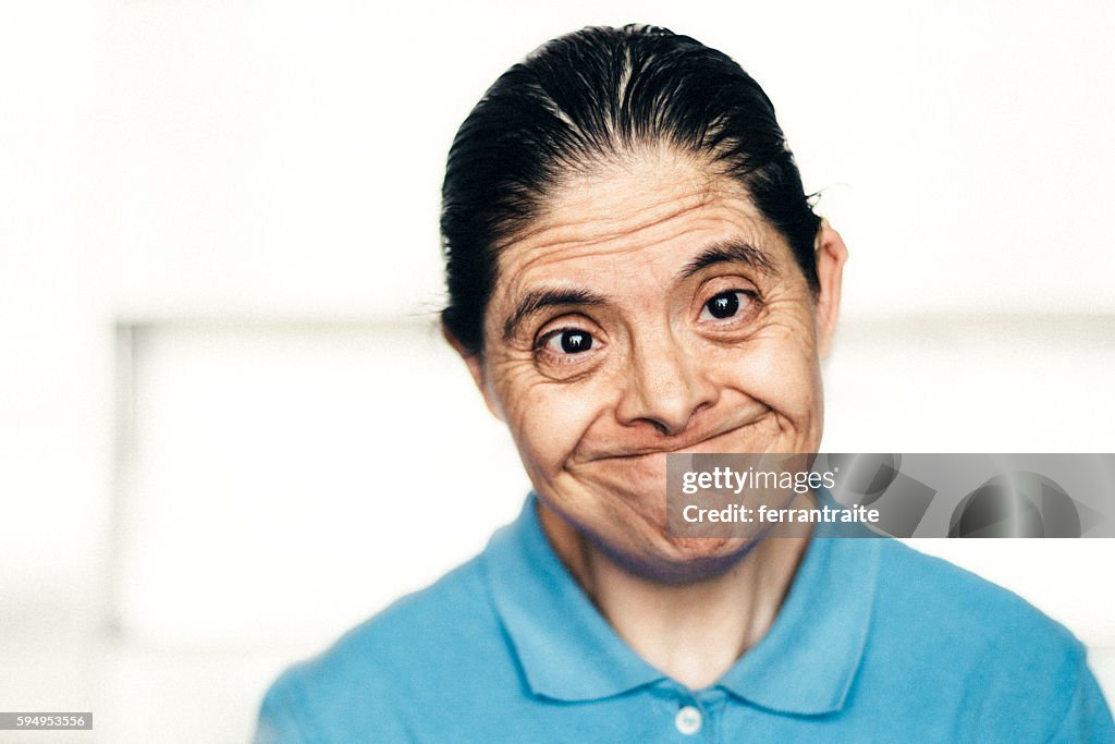 Senior Mexican woman with down syndrome