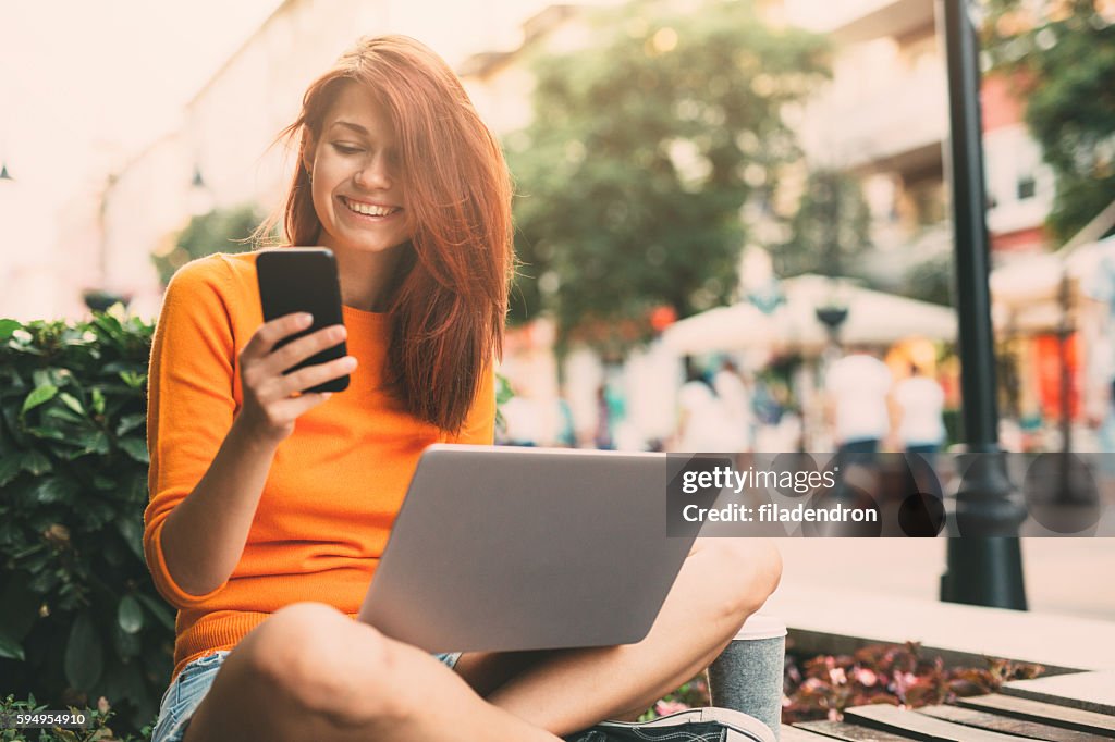 Woman texting outdoor