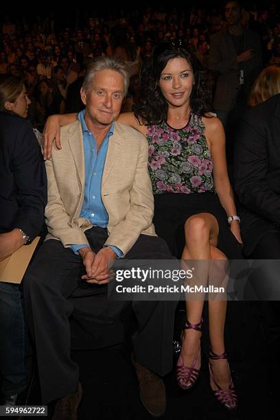 Michael Douglas and Catherine Zeta-Jones attend Michael Kors Spring 2006 Collection at The Tent at Bryant Park on September 14, 2005 in New York City.