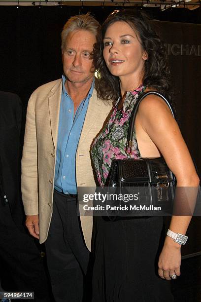 Michael Douglas and Catherine Zeta Jones attend Michael Kors Spring 2006 Collection at The Tent at Bryant Park on September 13, 2005 in New York City.