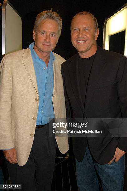 Michael Douglas and Michael Kors attend Michael Kors Spring 2006 Collection at The Tent at Bryant Park on September 13, 2005 in New York City.
