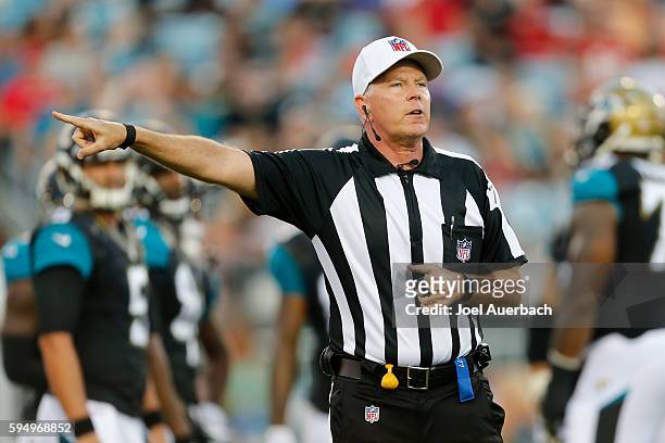 Referee Terry McAulay makes a call during first quarter actin between the Jacksonville Jaguars and the Tampa Bay Buccaneers during a preseason game...