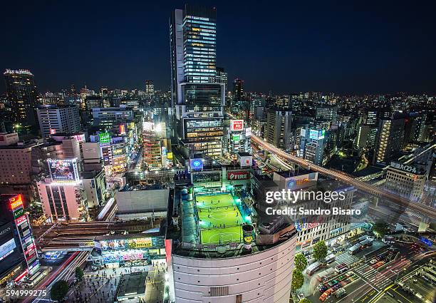 shibuya hikarie skyline at night - shibuya stock-fotos und bilder