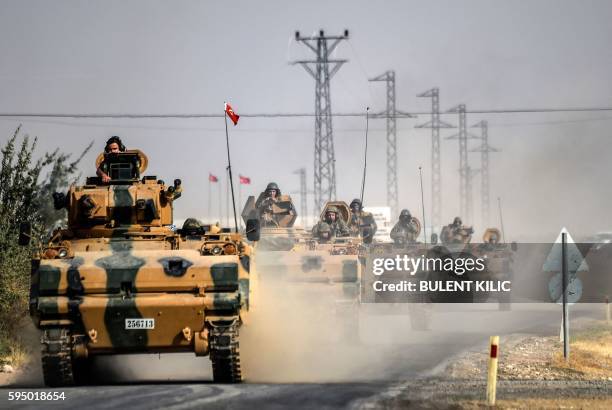 This picture taken around 5 kilometres west from the Turkish Syrian border city of Karkamis in the southern region of Gaziantep, on August 25, 2016...