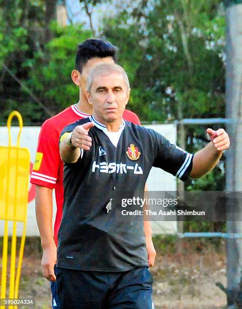 Nagoya Grampus interim head coach Bosko Gjurovski instructs his players during a training session on August 23, 2016 in Toyota, Aichi, Japan.