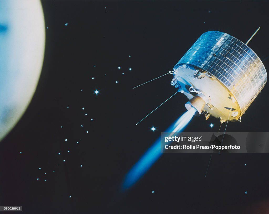 Sycom 3 Mock up view of a Syncom communications satellite shown burning fuel ...