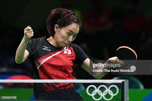 Kasumi Ishikawa of Japan competes in a match against Feng Tianwei of Singapore during the Women's Team Bronze Medal match on Day 11 of the Rio 2016...