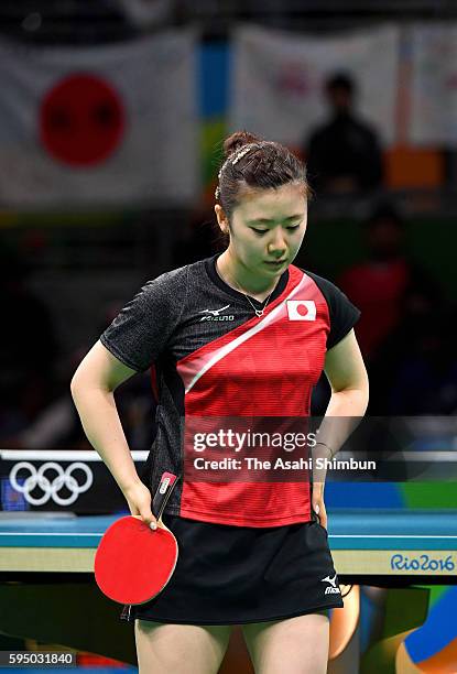 Ai Fukuhara of Japan reacts a point in a match against Mengyu Yu of Singapore during the Women's Team Bronze Medal match on Day 11 of the Rio 2016...