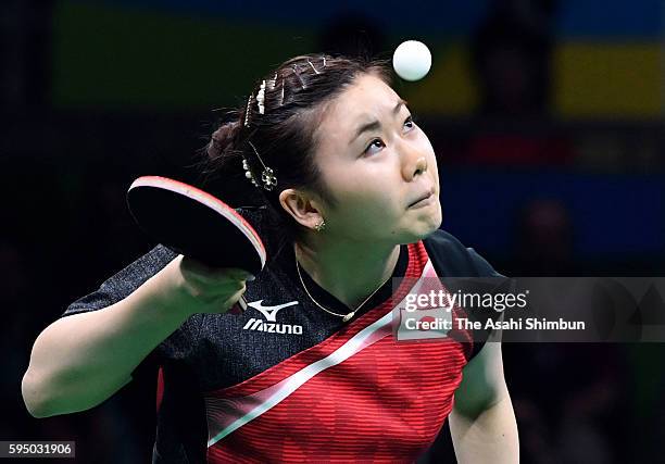 Ai Fukuhara of Japan serves in a match against Mengyu Yu of Singapore during the Women's Team Bronze Medal match on Day 11 of the Rio 2016 Olympic...