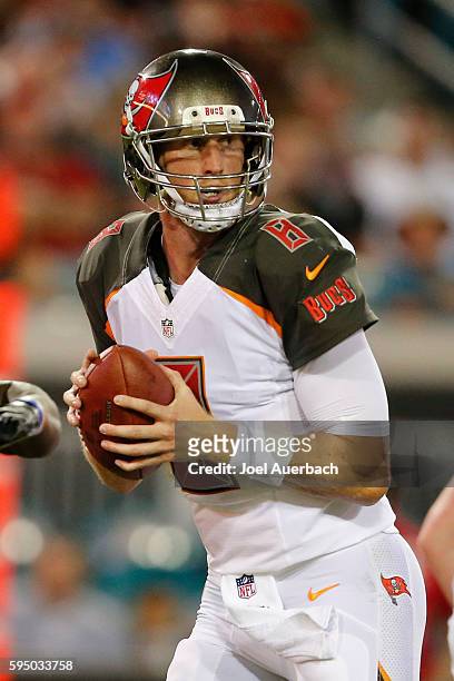 Mike Glennon of the Tampa Bay Buccaneers drops back to pass the ball against the Jacksonville Jaguars during a preseason game on August 20, 2016 at...