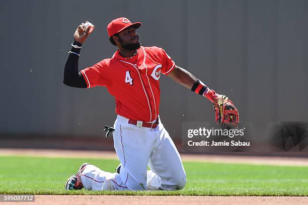 Brandon Phillips of the Cincinnati Reds throws to first base against the Los Angeles Dodgers at Great American Ball Park on August 21, 2016 in...