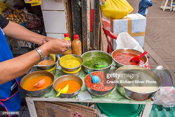 spiced bolws of sauces at the mercado central in lima peru - lima stockfoto's en -beelden