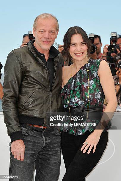 Pascal Greggory and Geraldine Pailhas at the photo call for ?Rebecca H. ? during the 63rd Cannes International Film Festival.