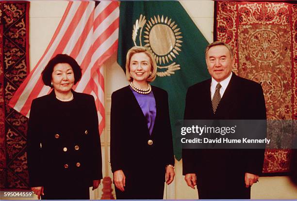 First Lady Hillary Clinton pose for photographers with Kazakh President Nursultan Nazarbayev and his wife, First Lady Sara Nazarbayeva , Almaty,...