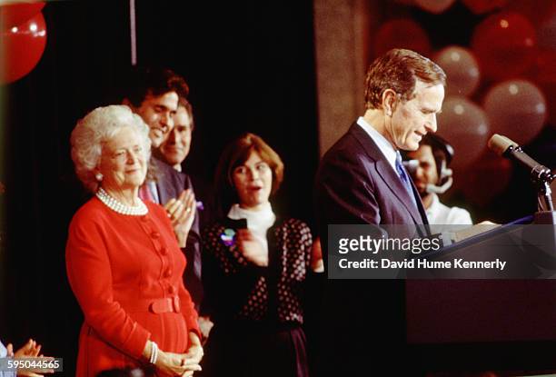 President George H.W. Bush delivers his concession speech as First Lady Barbara Bush looks on on election night, November 3, 1992 in Houston, Texas....