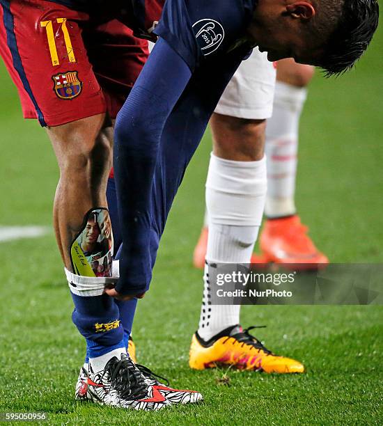 March 16- SPAIN: the shinguard of Neymar Jr. With the image of him and his father during the match between FC Barcelona and Arsenal FC, corresponding...