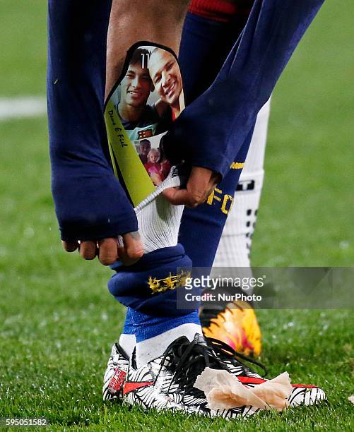 March 16- SPAIN: the shinguard of Neymar Jr. With the image of him and his father during the match between FC Barcelona and Arsenal FC, corresponding...