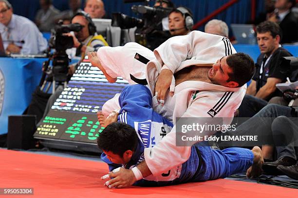 Sung-Min Kim of South Korea fights against Mohammad Rodaki of Iran during the bronze medal match of the men's over 100kg category of the World Judo...