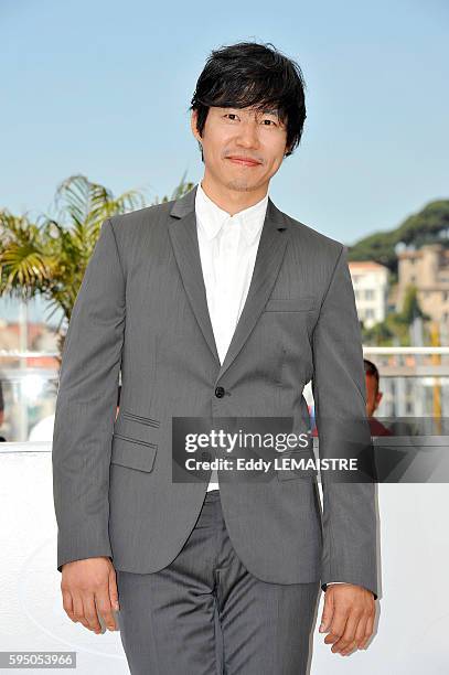 Joonsang Yu at the photo call for ?Ha Ha Ha? during the 63rd Cannes International Film Festival.