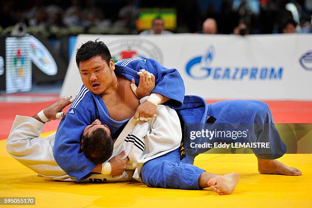 Sung-Min Kim of South Korea fights against Mohammad Rodaki of Iran during the bronze medal match of the men's over 100kg category of the World Judo...