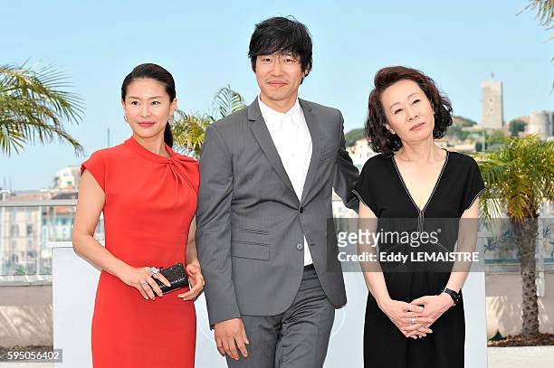 Jiwon Ye, Joonsang Yu and Yuh-Jung Youn at the photo call for ?Ha Ha Ha? during the 63rd Cannes International Film Festival.