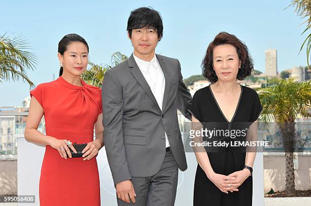 Jiwon Ye, Joonsang Yu and Yuh-Jung Youn at the photo call for ?Ha Ha Ha? during the 63rd Cannes International Film Festival.