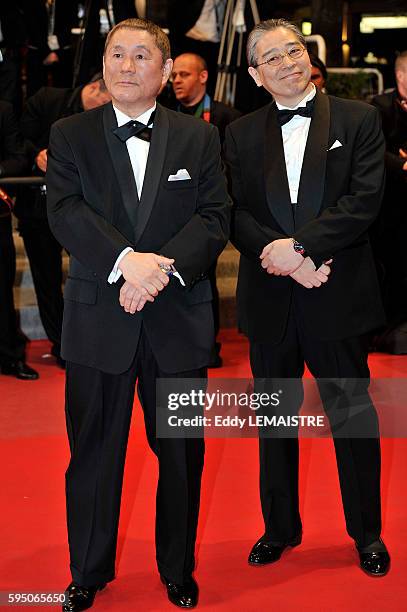 Writer/director/actor Takeshi Kitano and Producer Masayuki Mori at the premiere of ?Outrage? during the 63rd Cannes International Film Festival.